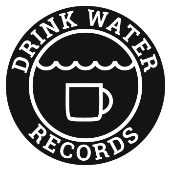 A circular black and white logo. The outside of the circle reads DRINK WATER RECORDS in a serif white font, and inside there is a white circle surrounding an illustration of a mug underwater.